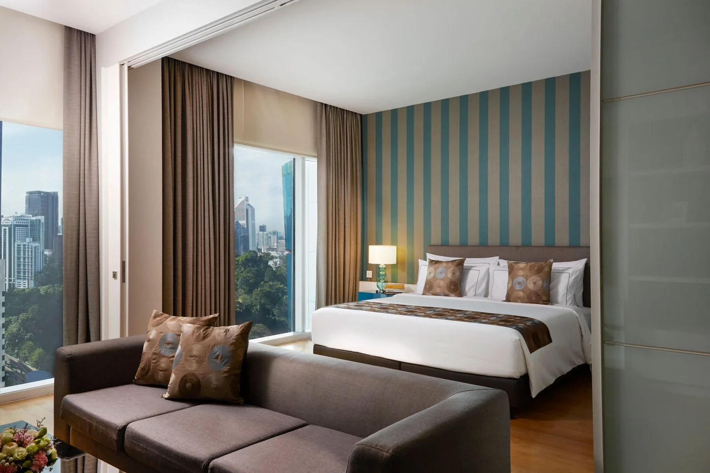 THE FACE Suites bedroom with Kuala Lumpur city view, real photo