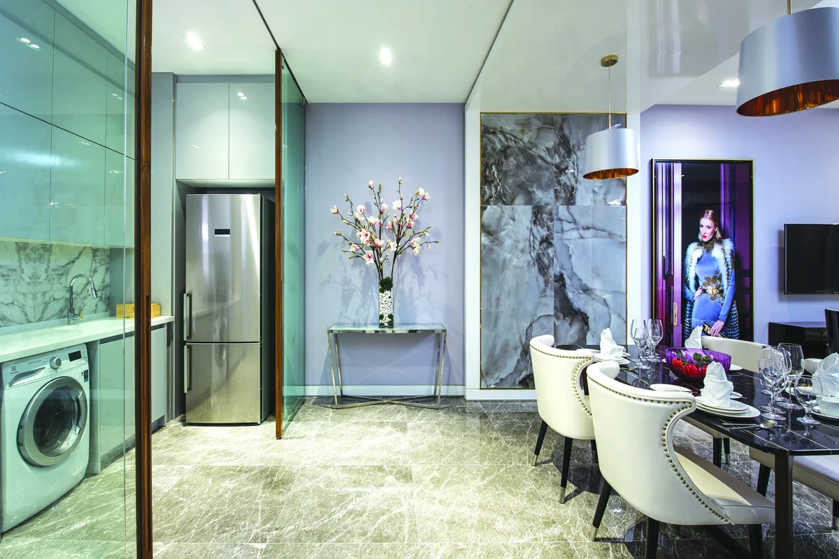 THE FACE Suites fully fitted kitchen and dining area, real photo